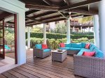 The patio offers a lot of room for reading, play or just relax on the loungers. 